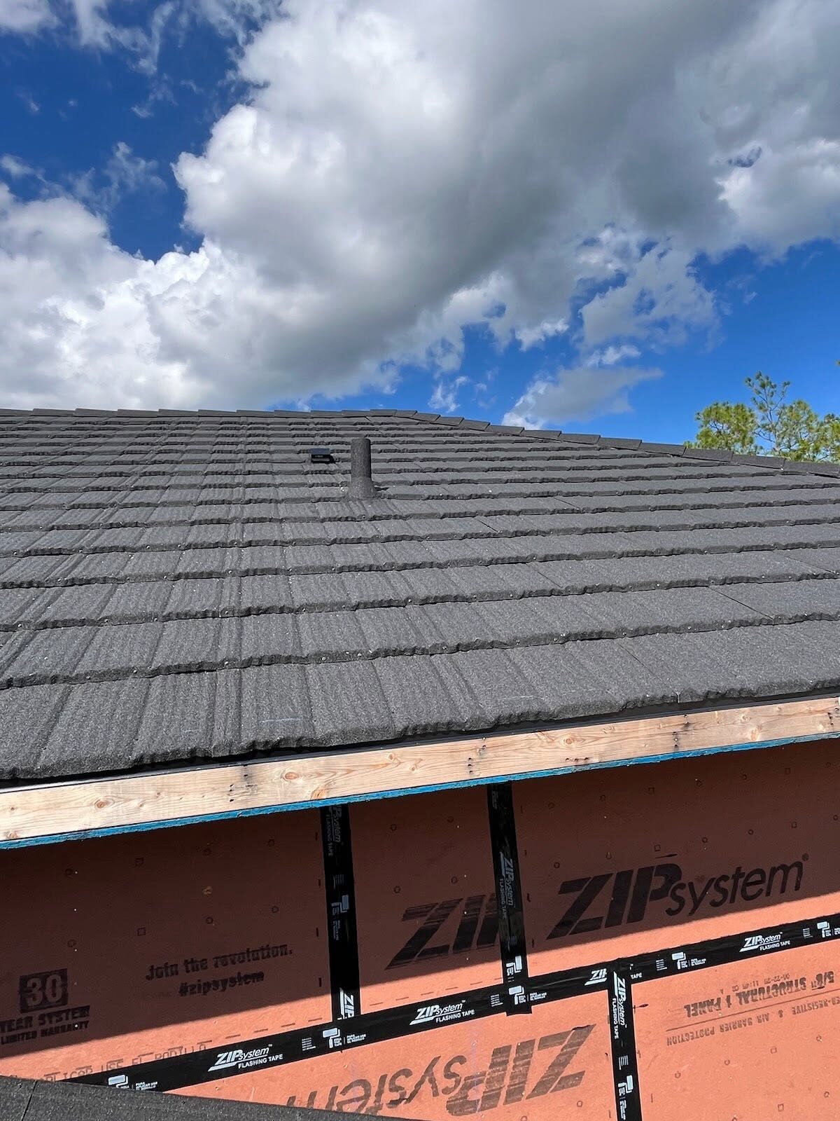 Close-up of roof vent boots during ZIP System dry-in