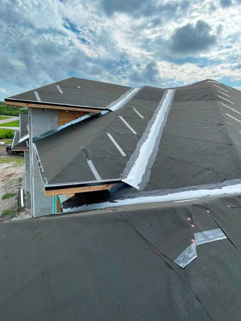 Finished shingle roof ridge and ventilation detail